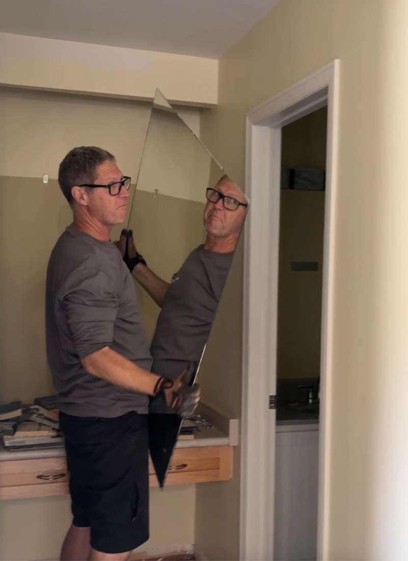 Two of the team lifting a panel into place